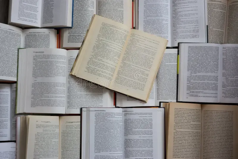 Open books laid out on a table